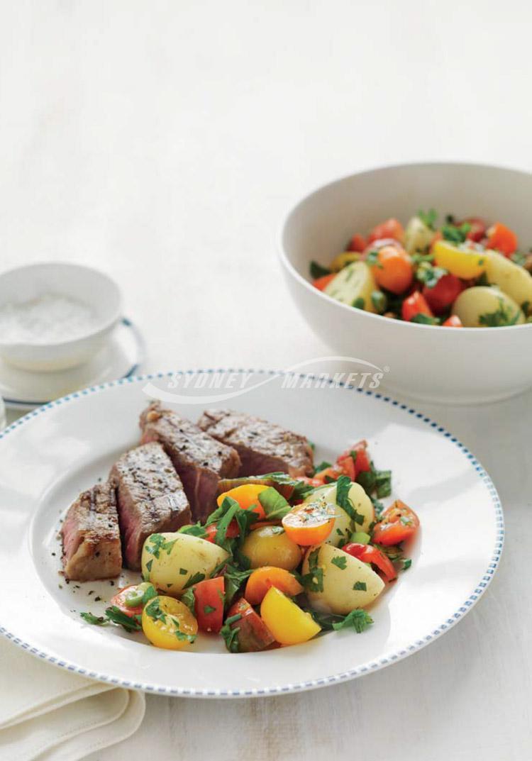 Potato & tomato medley salad with steaks