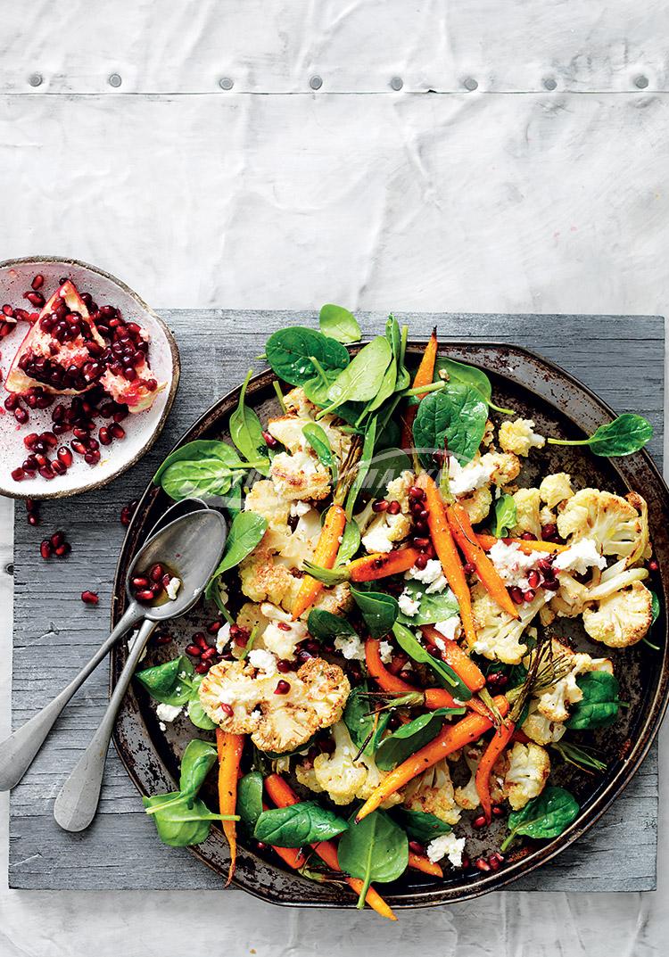 Spiced cauliflower & carrots with spinach & pomegranate