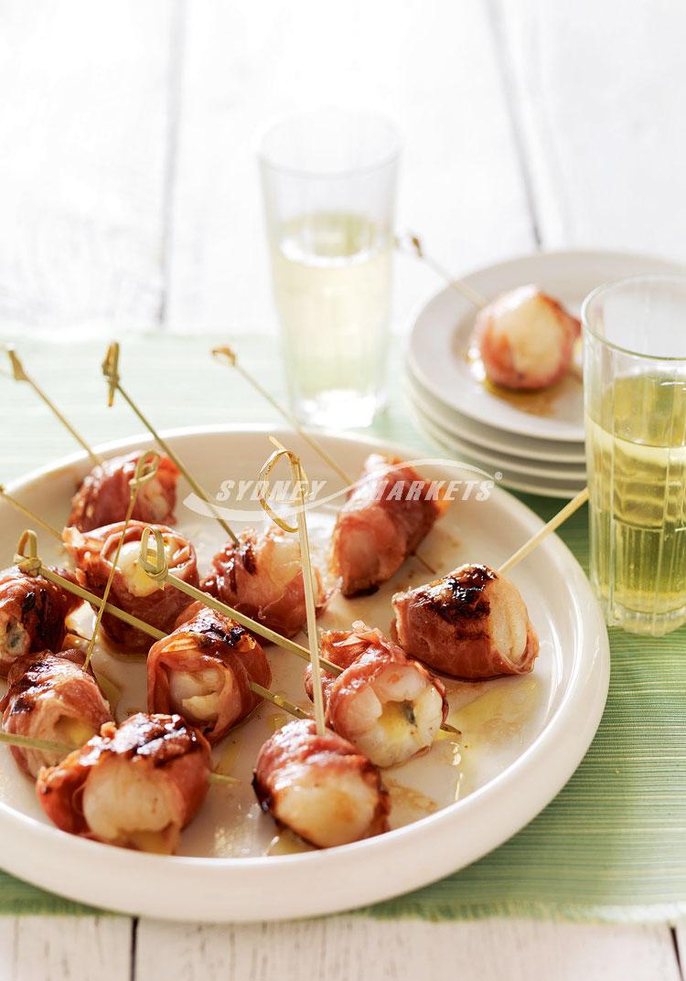 BBQ lychees wrapped in prosciutto