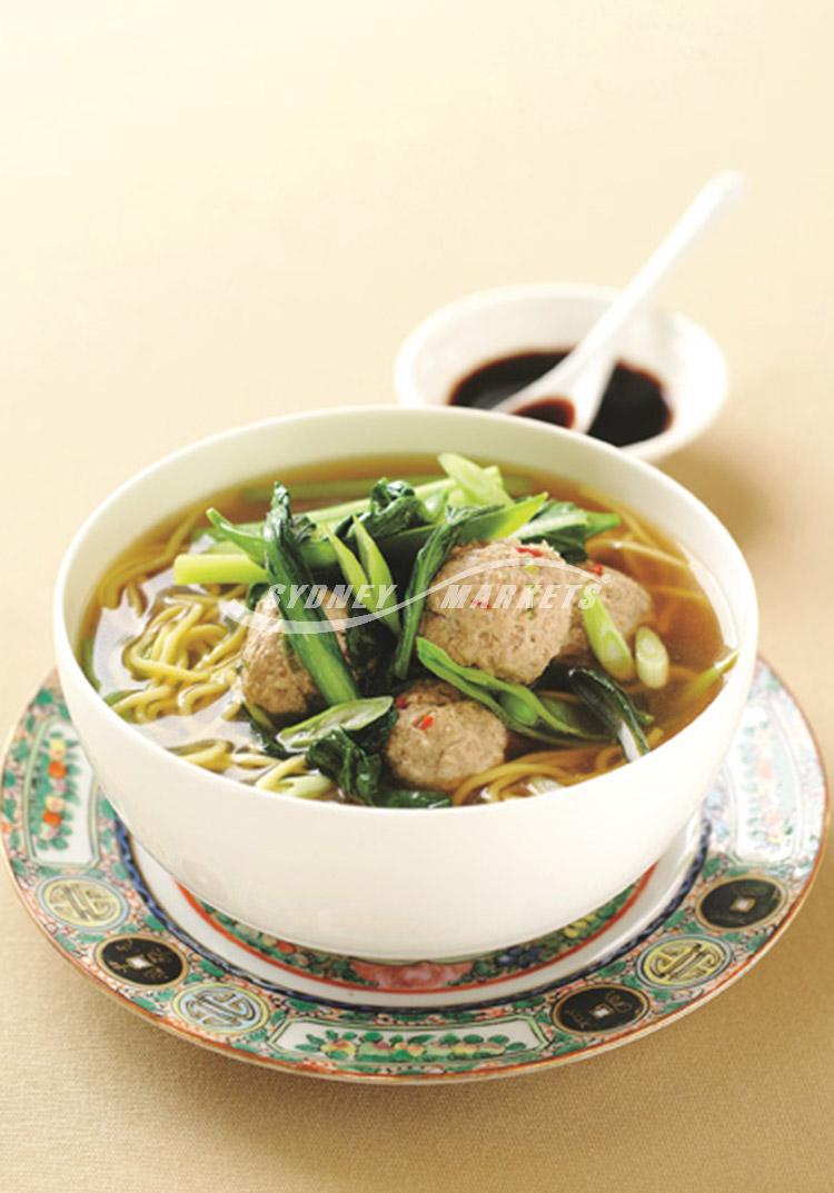 Choy sum, chilli pork meatball & noodle soup