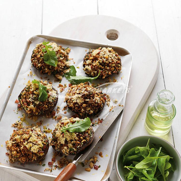 Mushrooms with bacon & pine nut crumbs