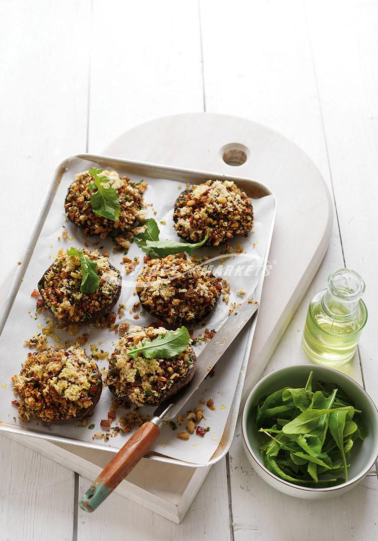 Mushrooms with bacon & pine nut crumbs