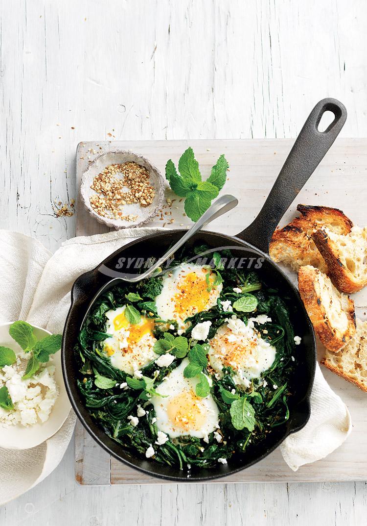 Sauteed greens with eggs, mint & feta