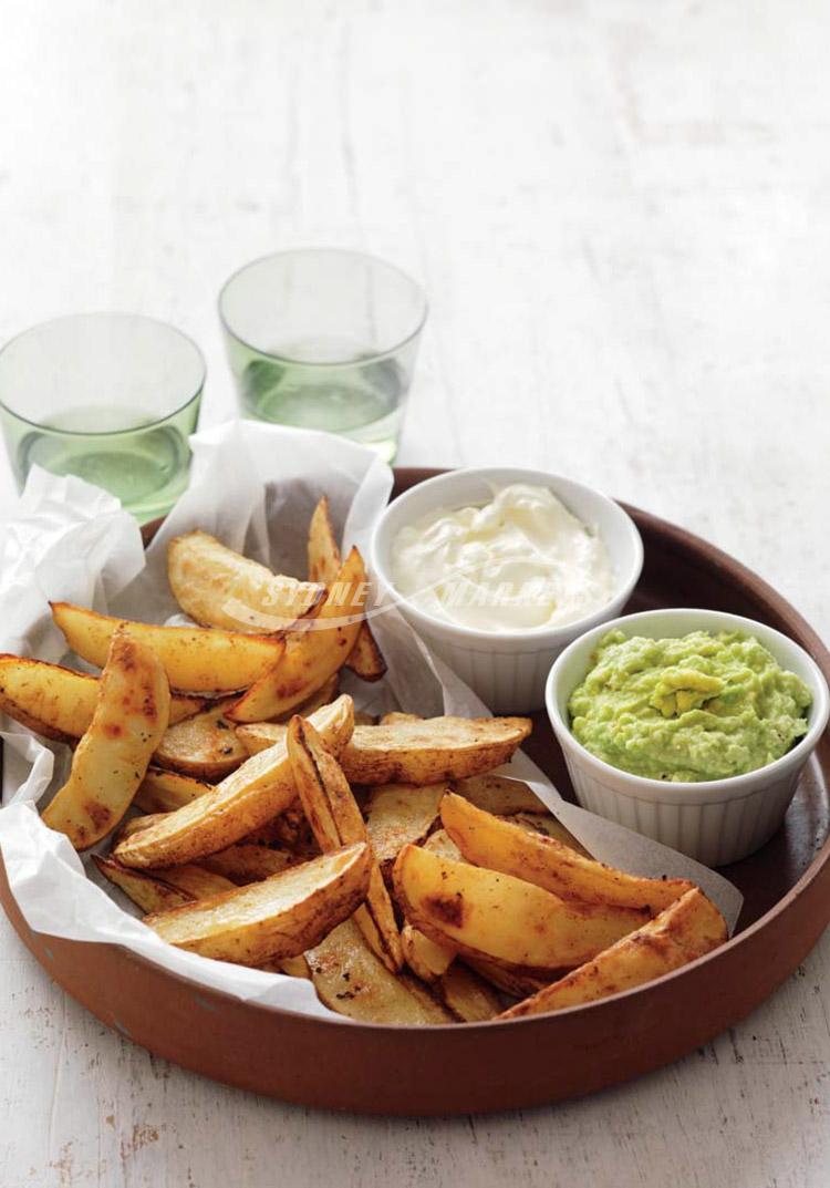 Spicy roasted potato wedges with avocado dip