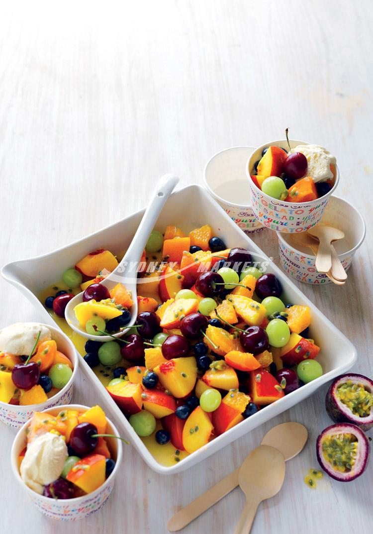 Summer fruit salad with passionfruit & orange drizzle