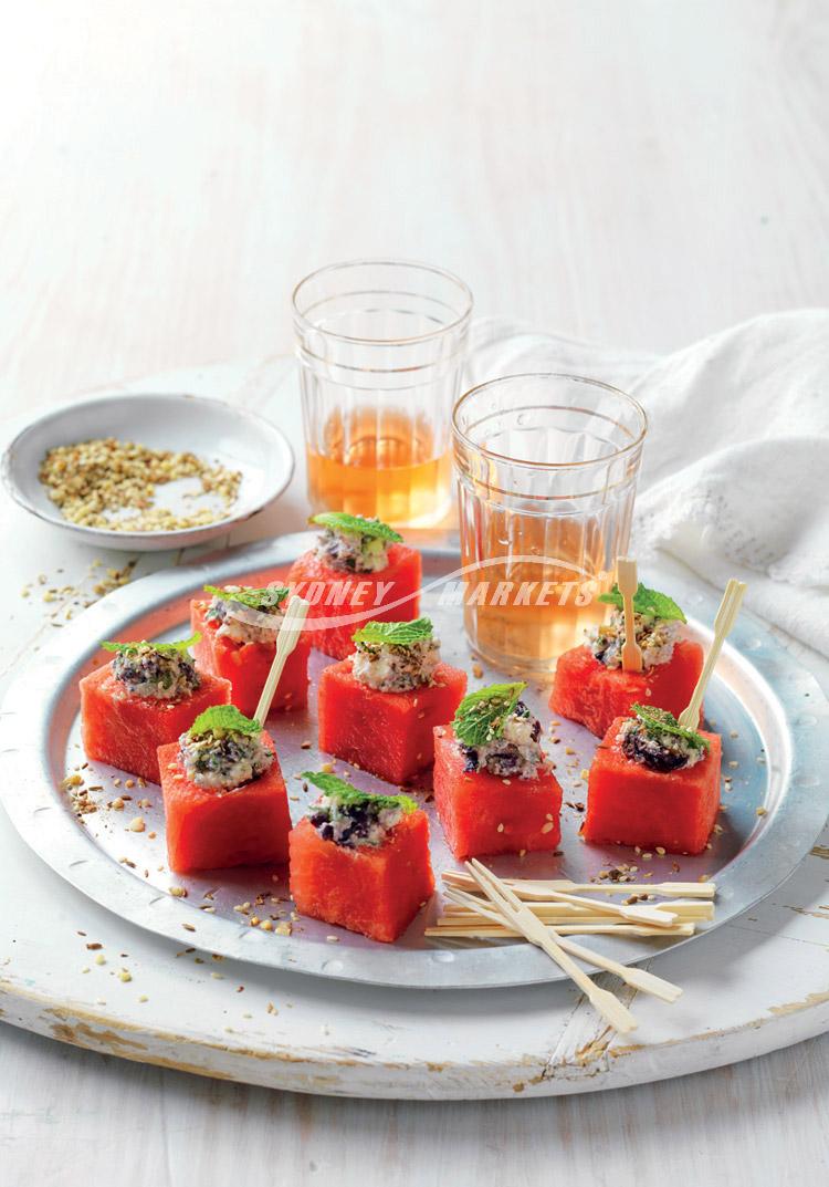 Watermelon cubes with feta, olives & mint